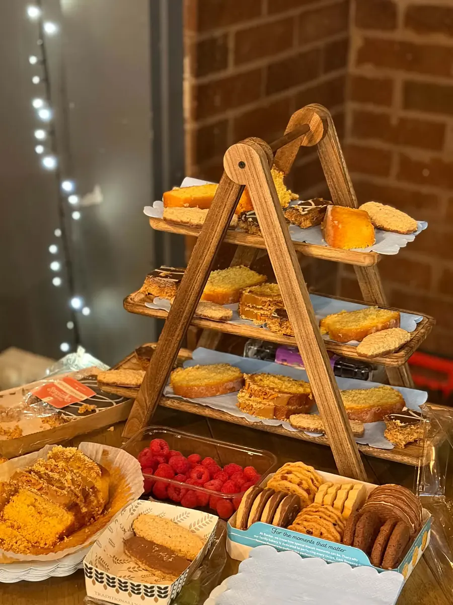 Cakes and refreshments prepared for a Love From George coffee morning