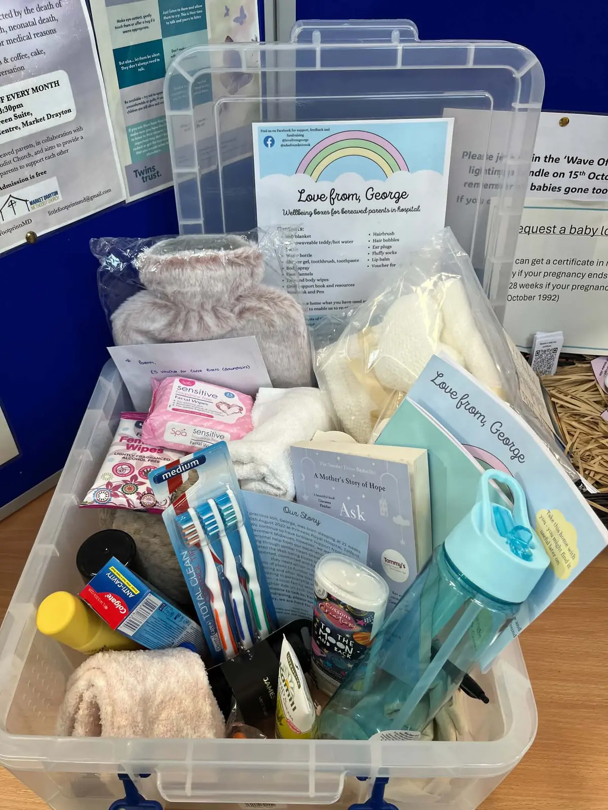 Open Love From George Wellbeing Box filled with comfort items and practical essentials